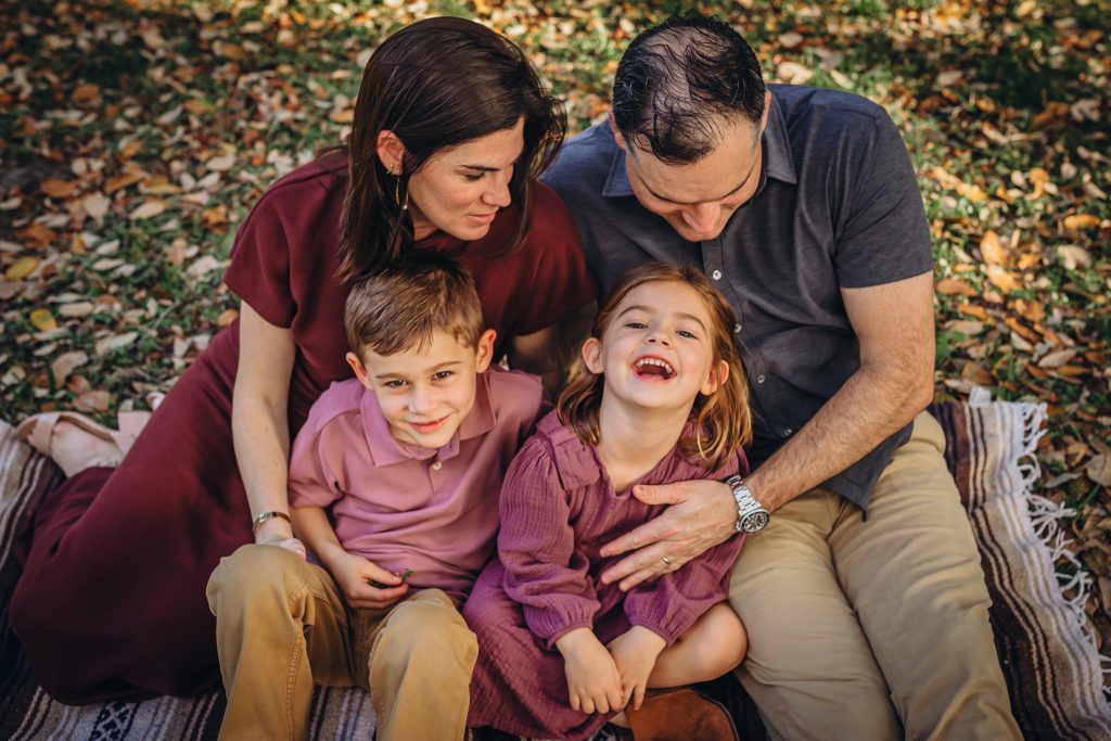 Family session on a blanket at the park.